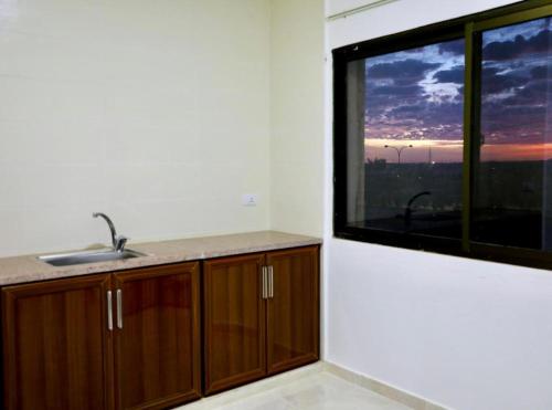 Kitchen, Salvador Dali Apartments in Al Qastal