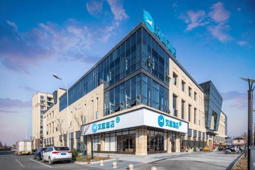 . Hanting Hotel Xinghua Anfeng Huifeng Living Square