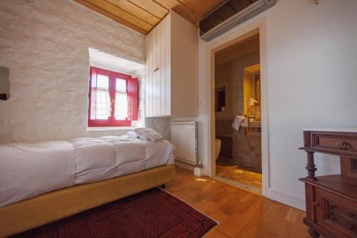 LITHOS TRADITIONAL TOWER in Omales