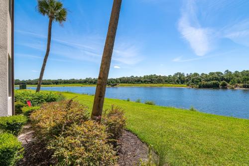 12th Hole Hideaway! Ground floor condo at Lakewood National Golf Club!