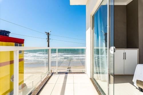 Duplex pé na areia com vista deslumbrante RAT001