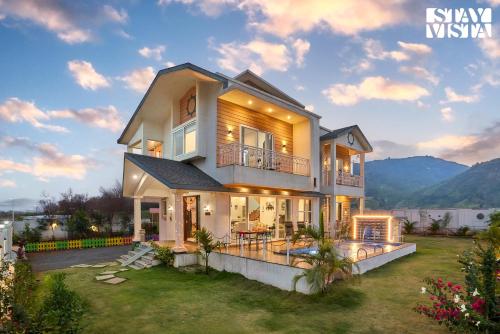 Exterior view, StayVista's Kaarma Villa - Valley-View Villa with Outdoor Pool, Lawn featuring a Gazebo & Machan near Karla Caves