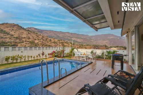 Swimming pool, StayVista's Kaarma Villa - Valley-View Villa with Outdoor Pool, Lawn featuring a Gazebo & Machan near Karla Caves