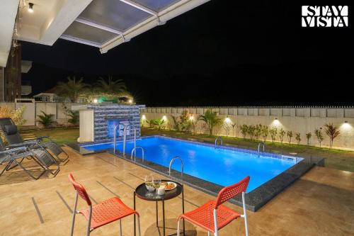 Swimming pool, StayVista's Kaarma Villa - Valley-View Villa with Outdoor Pool, Lawn featuring a Gazebo & Machan near Karla Caves