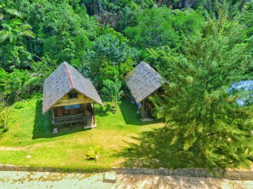 Vista exterior, Ricky's Beach House in Sigunturmuda