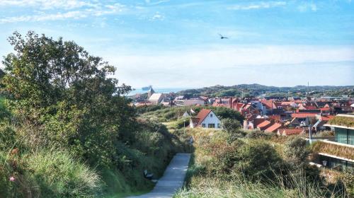 Vrijstaand vakantiehuis, 5 minuten lopen van het strand in Zoutelande