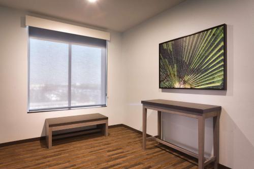 Specialty One-Bedroom Corner Suite with Two Queen Beds, Sofa Bed and Kitchen