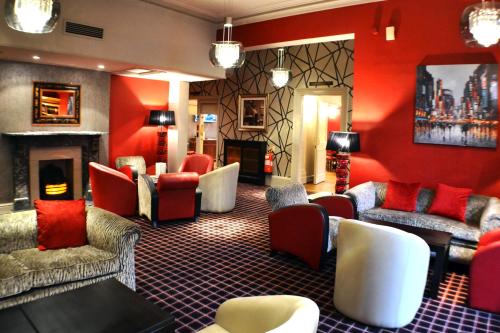 Shared lounge/TV area, Belmont Leicester Hotel in Leicester