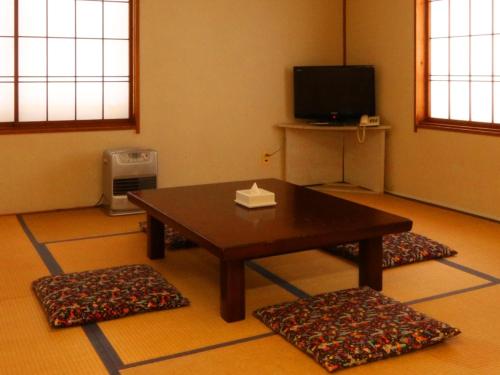 Japanese-Style Family Room with Shared Bathroom