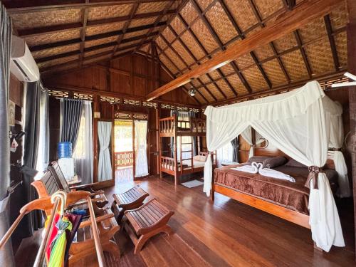 B&B Timbang Lawan - Orangutan Orchard Bungalow - Bed and Breakfast Timbang Lawan