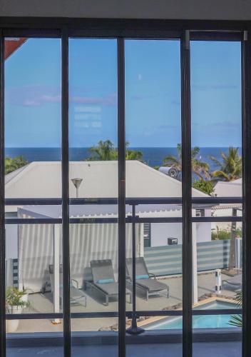 ทัศนียภาพ, Villa aux orchidées - 3 chambres piscine vue Mer - Salon Climatisée (Villa aux orchidees - 3 chambres piscine vue Mer - Salon Climatisee) in มาเร่ เกลลาร์ด