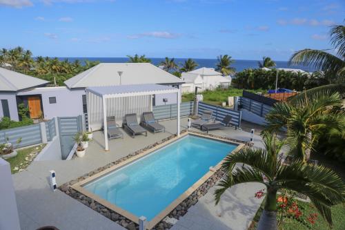 ทัศนียภาพ, Villa aux orchidées - 3 chambres piscine vue Mer - Salon Climatisée (Villa aux orchidees - 3 chambres piscine vue Mer - Salon Climatisee) in มาเร่ เกลลาร์ด