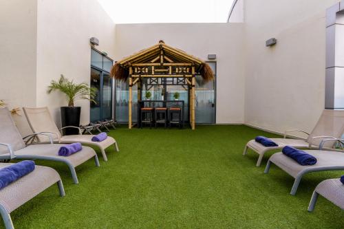 Swimming pool, First Central Hotel Suites near American School of Dubai