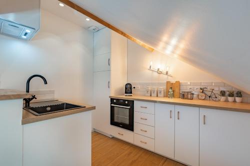 廚房, T2 cosy et chic près de la Défense et de Paris (T2 cosy et chic pres de la Defense et de Paris) in 邁松拉菲特