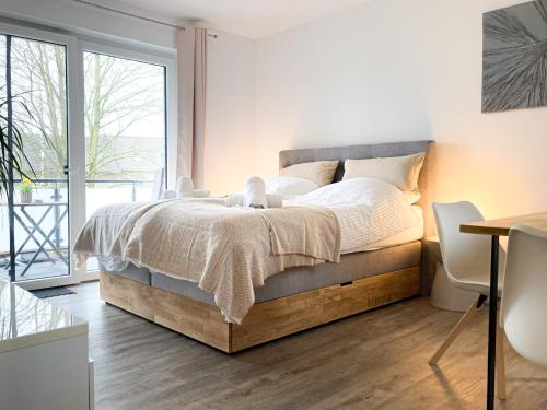 B&B Elten - PEARLs - Stilvolle Neubauwohnung am Niederrhein - Bed and Breakfast Elten