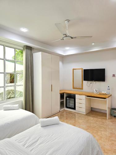 Keveli Guesthouse Room Type - Deluxe Twin Room Keveli Guesthouse Room Type - Deluxe Twin Room