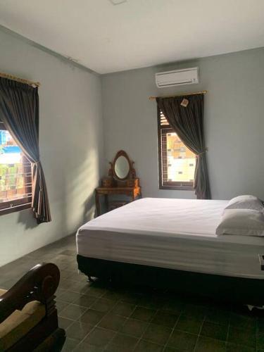 Homestay Mutiara - Tap to explore photos