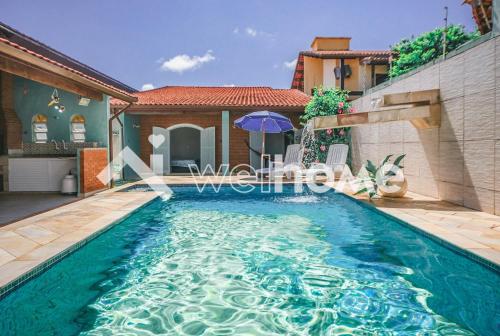 Casa com piscina a 270m da praia em Itanhaém, SP