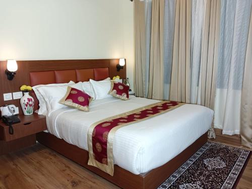 Deluxe Double Room room in Hotel Zingkham Residency