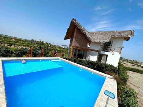 OASIS CHINCHA Casa de playa con Piscina 1era fila