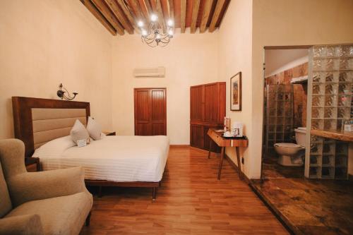 Hotel Casa Antigua - Tap to explore photos