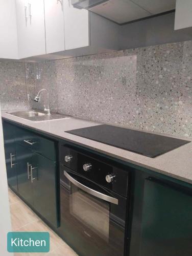 Kitchen, MD 1BRH & 2BRH HOUSE for Family,Group&Backpackers in Calapan