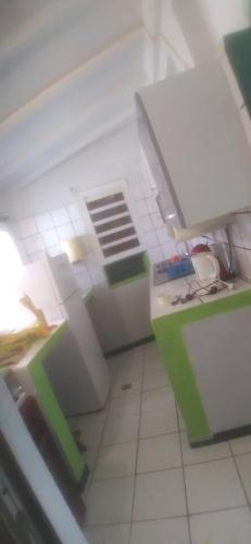 кухня, Maison confortable à Baie-Mahault avec climatisation (Maison confortable a Baie-Mahault avec climatisation) in Baie-Mahault