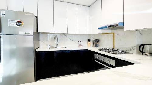 Elite LUX Holiday Homes - Luxe Gardenia 2BR Haven in Arjan Dubai, Dubái (foto 8)