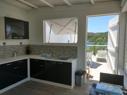 Cocina, Studio charmant avec vue sur la mer - 45 m² - Le Robert in Le Robert