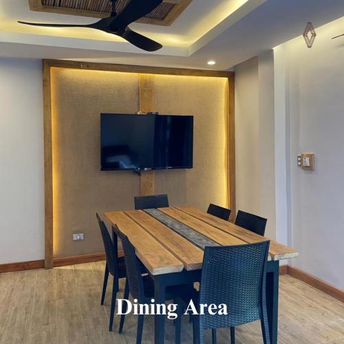 Shared lounge/TV area, Bugana Beach and Dive Resort in Sipalay