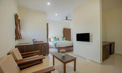 Deluxe Room with Balcony room in Treebo Samanvaya Retreat Mysore