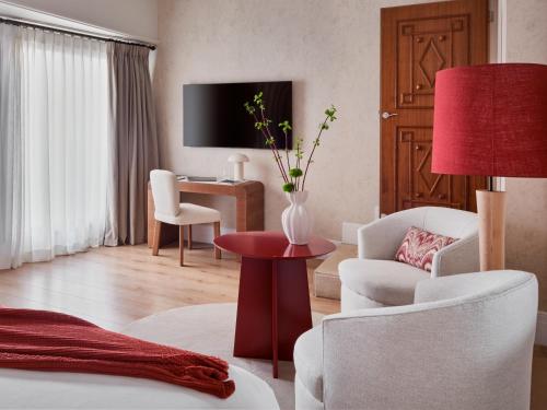 Boutique Hotel Posada Terra Santa - Tap to explore photos