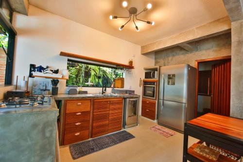 Conforto na Praia do Puruba - 5 quartos, completa, 200m do mar in Praia do Puruba