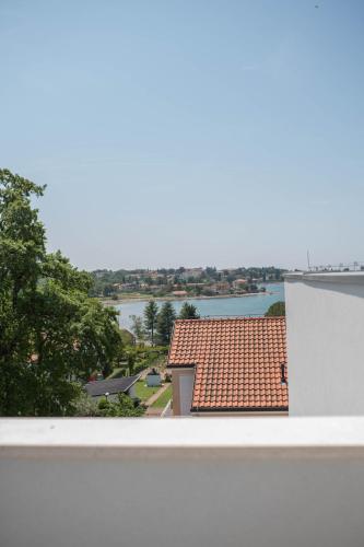 Two story One-Bedroom Apartment with Terrace and Partial Sea View