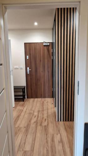 Cichy apartament na skraju Parku Śląskiego (Cichy apartament na skraju Parku Slaskiego) in Welnowiec