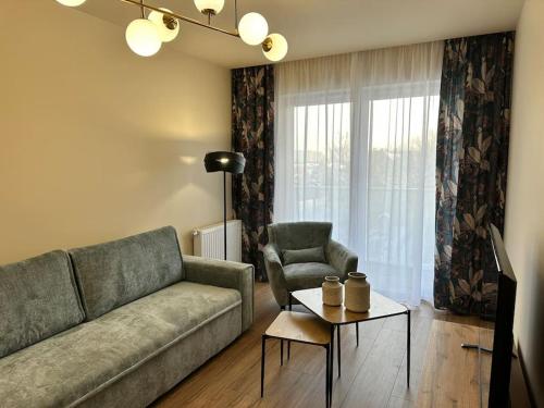 Cichy apartament na skraju Parku Śląskiego (Cichy apartament na skraju Parku Slaskiego) in Welnowiec