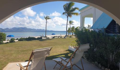 ระเบียง/ชานเรือน, โคราลิโต เบย์ สวีท แอนด์ วิลลา (Coralito Bay Suites and Villas) in แองกวิลลา