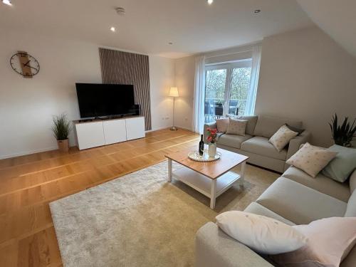 sala de TV, Ferienwohnung Dierkings Hof Niedernstöcken (Ferienwohnung Dierkings Hof Niedernstocken) in Schwarmstedt