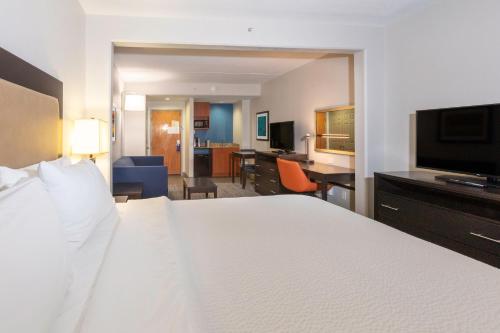 King Suite with Sofa Bed room in Holiday Inn Express & Suites Jacksonville Airport by IHG