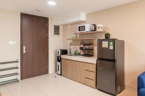 Facilities, Time Suit Cozy loft with WiFi and pool in Karawaci