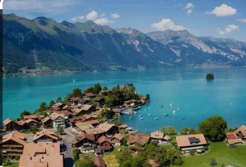 Romantic Swiss Alp Iseltwald with Lake & Mountains