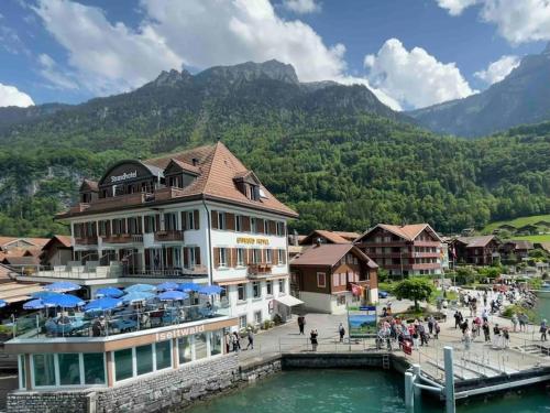 Romantic Swiss Alp Iseltwald with Lake & Mountains