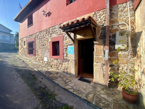 Casa en aldea frente a la Sierra de el Sueve