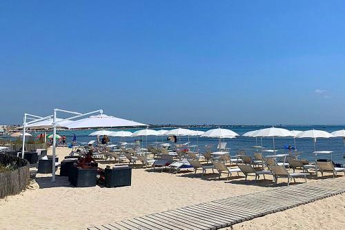 pludmale, Hotel la Spiaggia in Torre Lapillo