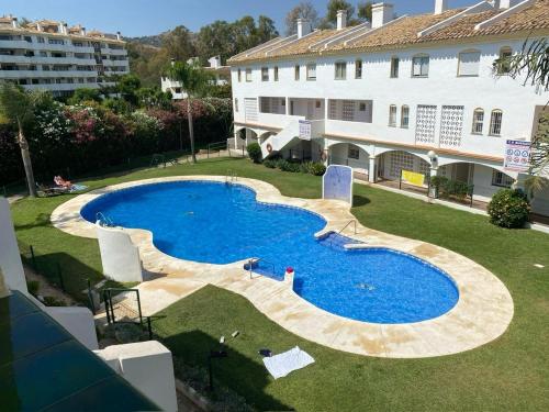 Spacious, calm and bright Duplex Apartment in Private Residence ideal for families, beach and golf