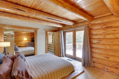 Hand-Crafted Cabin with Whitefish Lake Views!