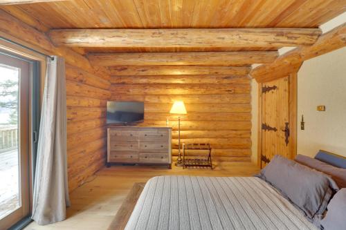 Hand-Crafted Cabin with Whitefish Lake Views!