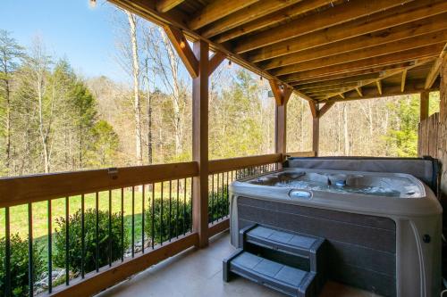 Log Cabin with Hot Tub Fire Pit Gym More in Sevierville, USA