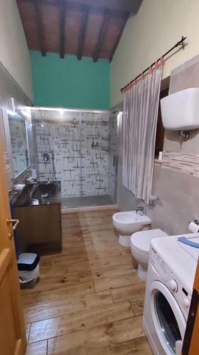 Una casa nel grano: Casa Luciola in تريفى