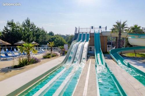 Bungalow de 3 chambres avec piscine partagee et terrasse amenagee a Saint Julien en Born a 9 km de la plage